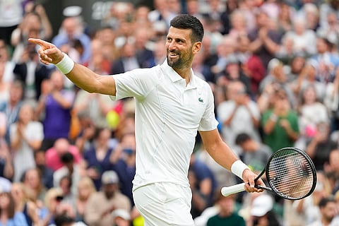 Novak Djokovic celebrates after defeating Vit Kopriva